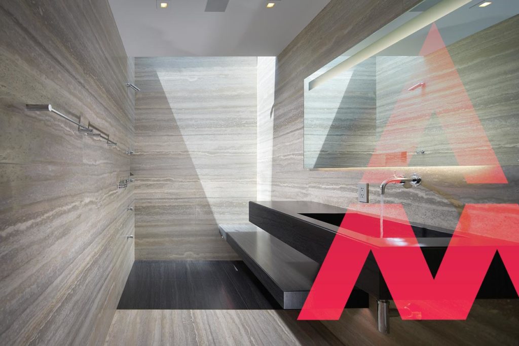 bathroom with grey travertine on wall and floor