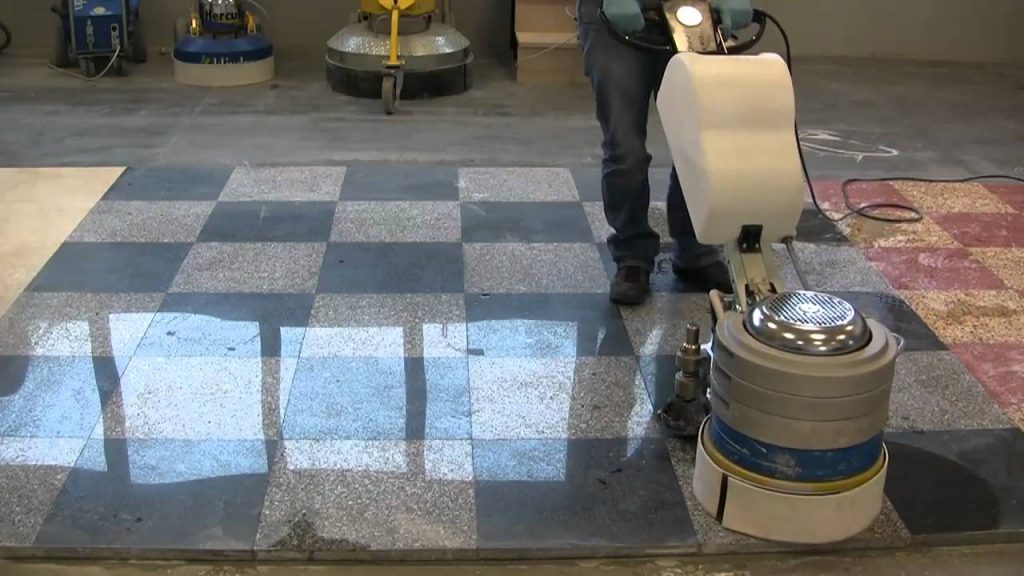 granite floor being polished with machine